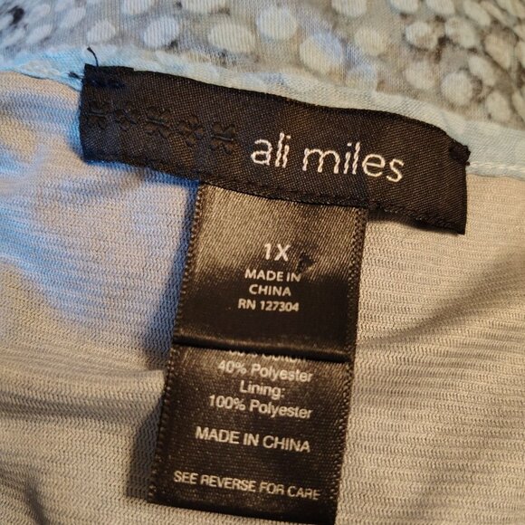 Ali Miles 1X Blue Leopard Print Tunic Top, 1/4 Button, Roll Tab Sleeve, Lace Hem - Picture 6 of 7